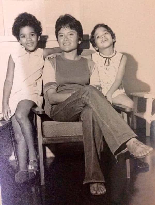 a young Afuwa and her sister, with their mother, Sandra Granger. 